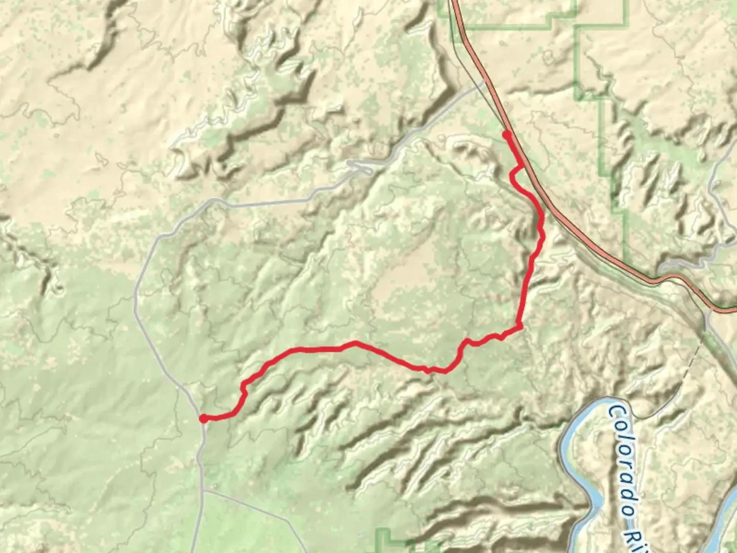 An image depicting the trail Gemini Bridges Road and its surrounding area.