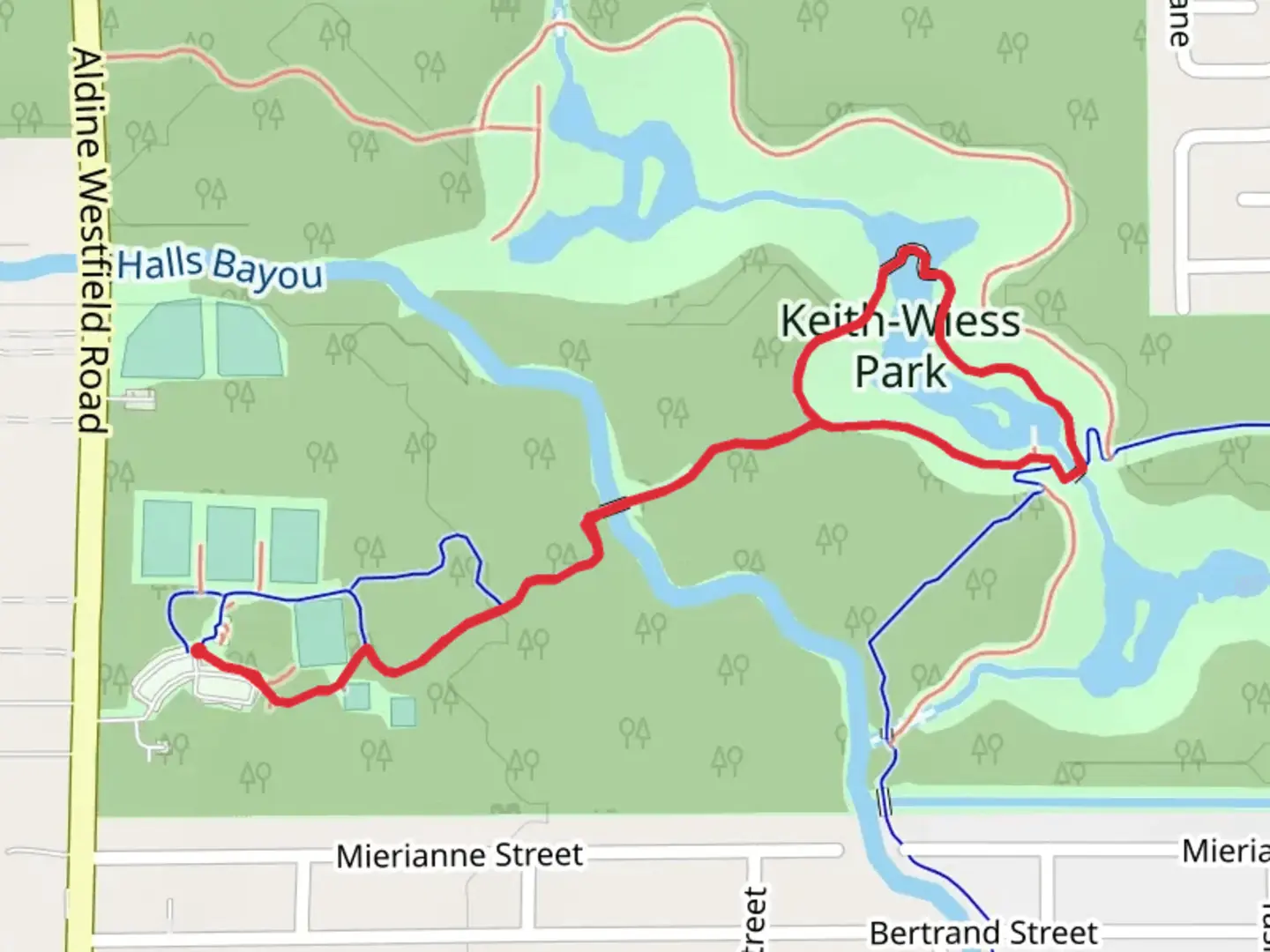 An image depicting the trail Keith-Wiess Park Loop via Halls Bayou Greenway Trail and its surrounding area.