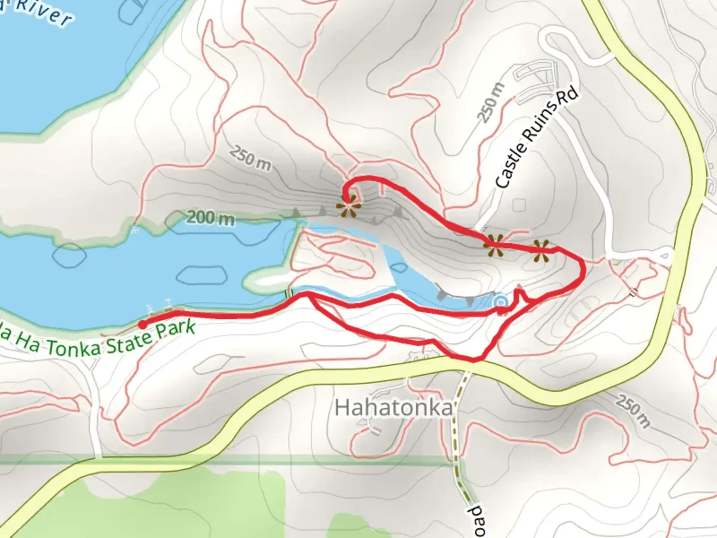 An image depicting the trail Deers Leap Hill - Spring Loop Trail and its surrounding area.