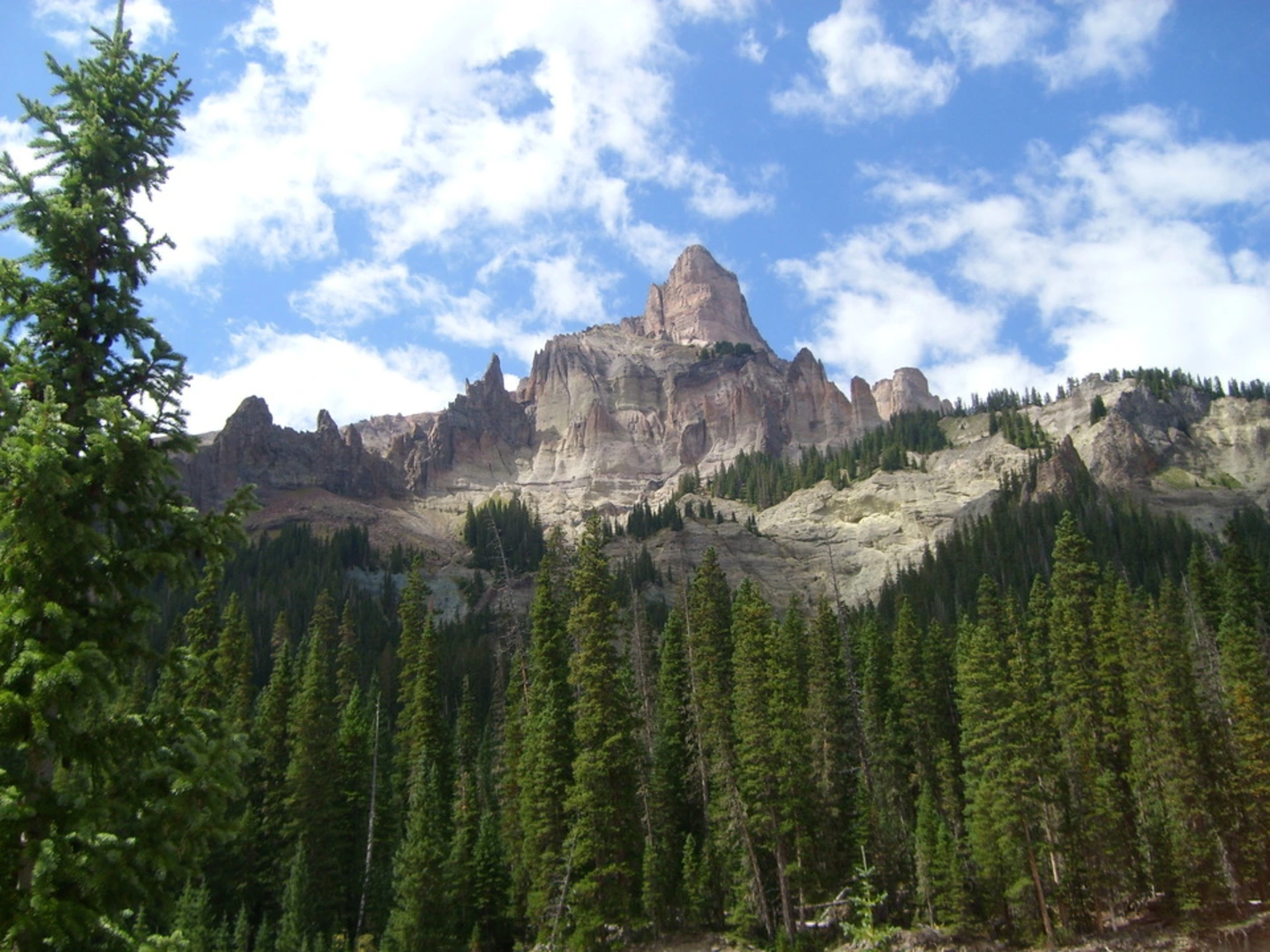 An image depicting the trail Little Cimarron Trail via Alpine Trail and its surrounding area.