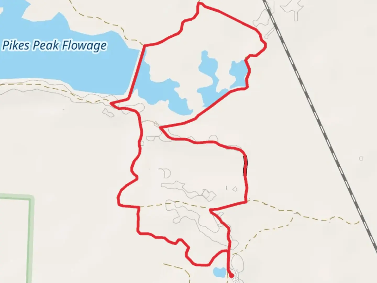 An image depicting the trail Pikes Peak Flowage and its surrounding area.