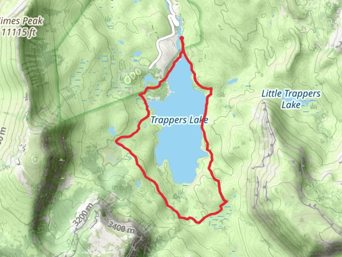 An image depicting the trail Trappers Lake Loop via Carhart Trail and its surrounding area.