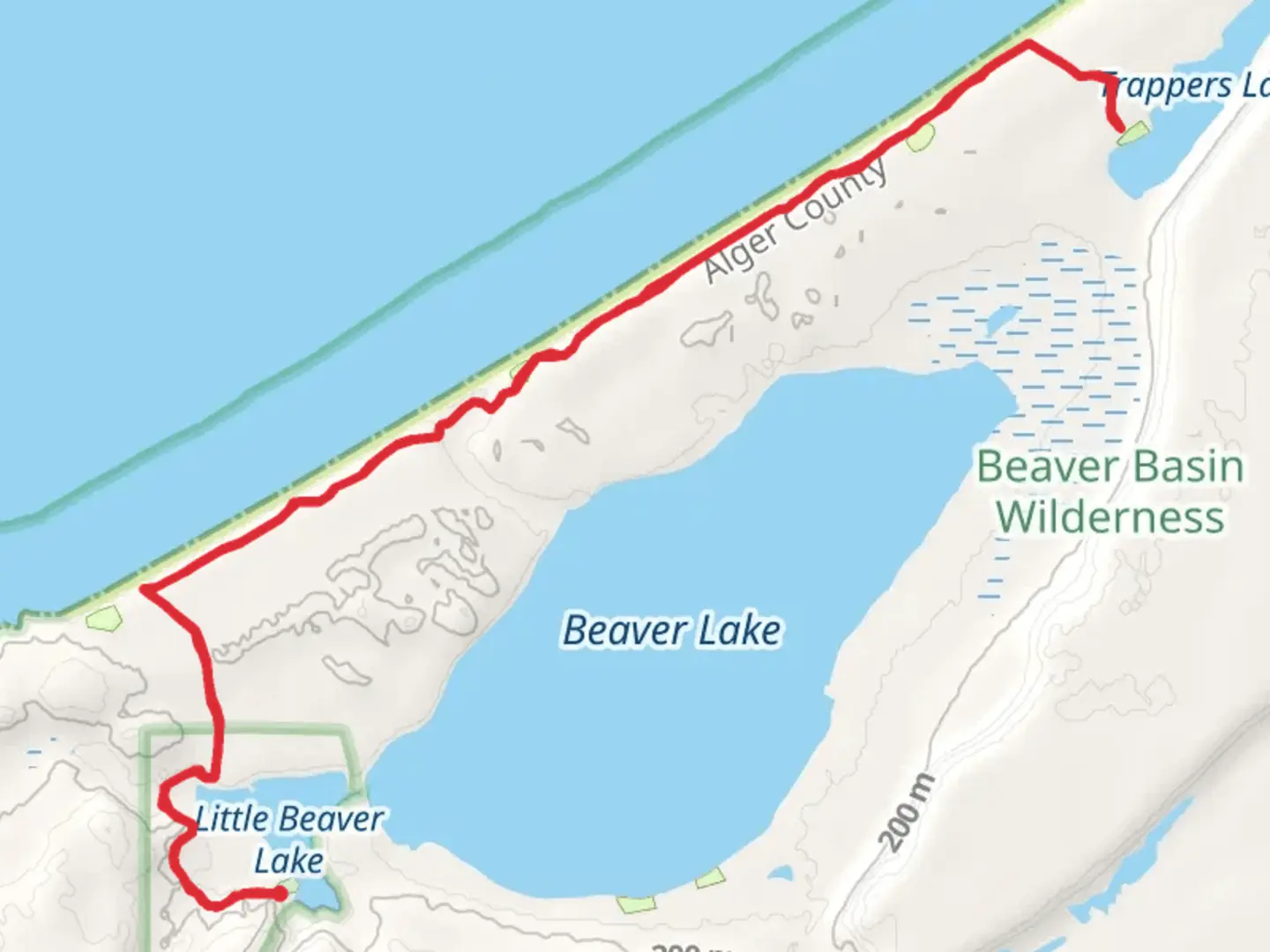 An image depicting the trail Trappers Lake via White Pine Trail and its surrounding area.