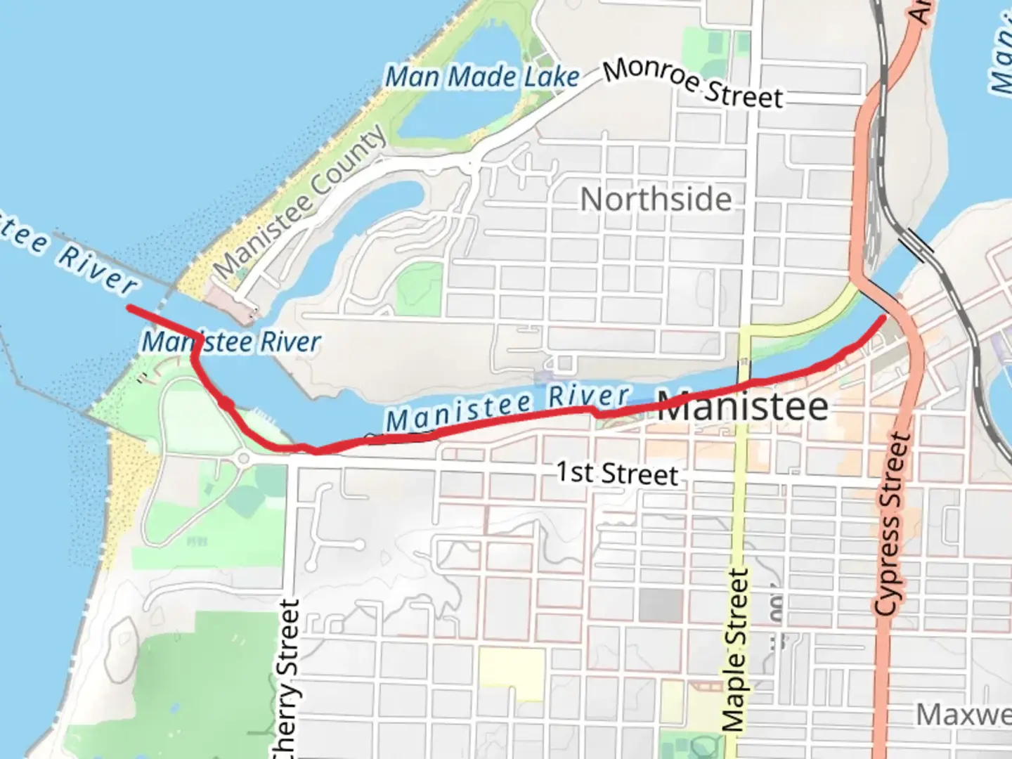 An image depicting the trail Manistee River Walk and its surrounding area.