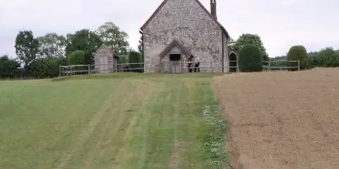 An image depicting the trail Rowlands Castle and St Hubbert's Church and its surrounding area.
