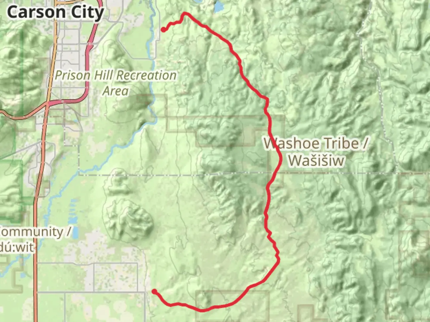 An image depicting the trail Sunrise Pass Road Walk and its surrounding area.