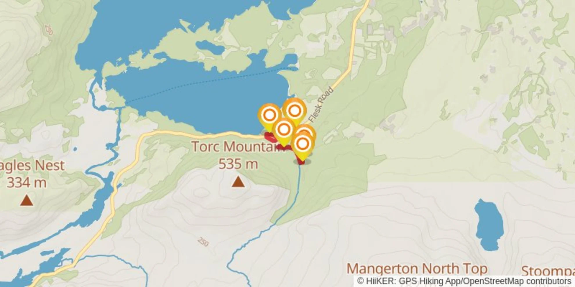 An image depicting the trail Torc Waterfall Loop and its surrounding area.