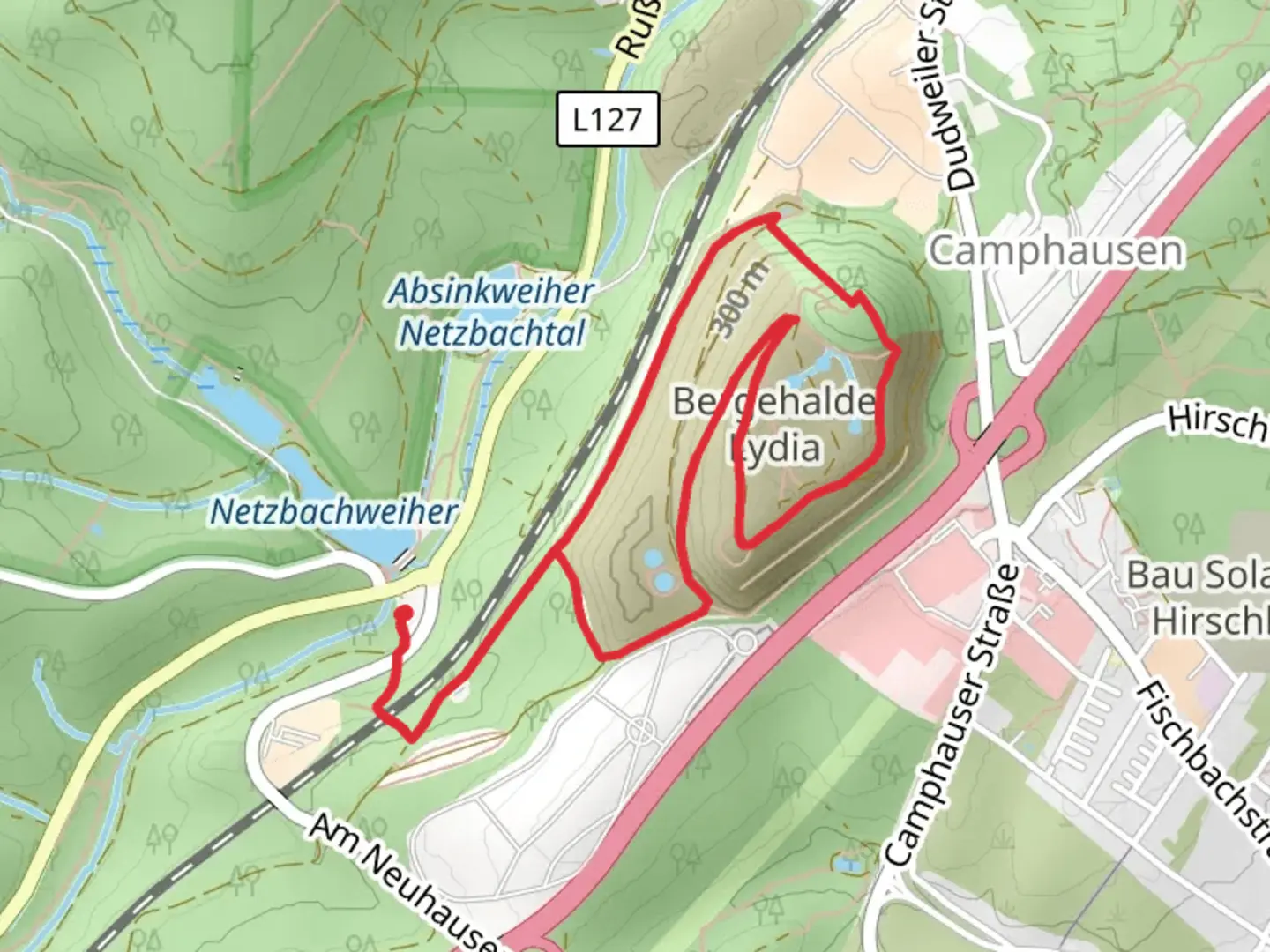 An image depicting the trail Himmelsspiegel Loop via Haldenrundweg and its surrounding area.