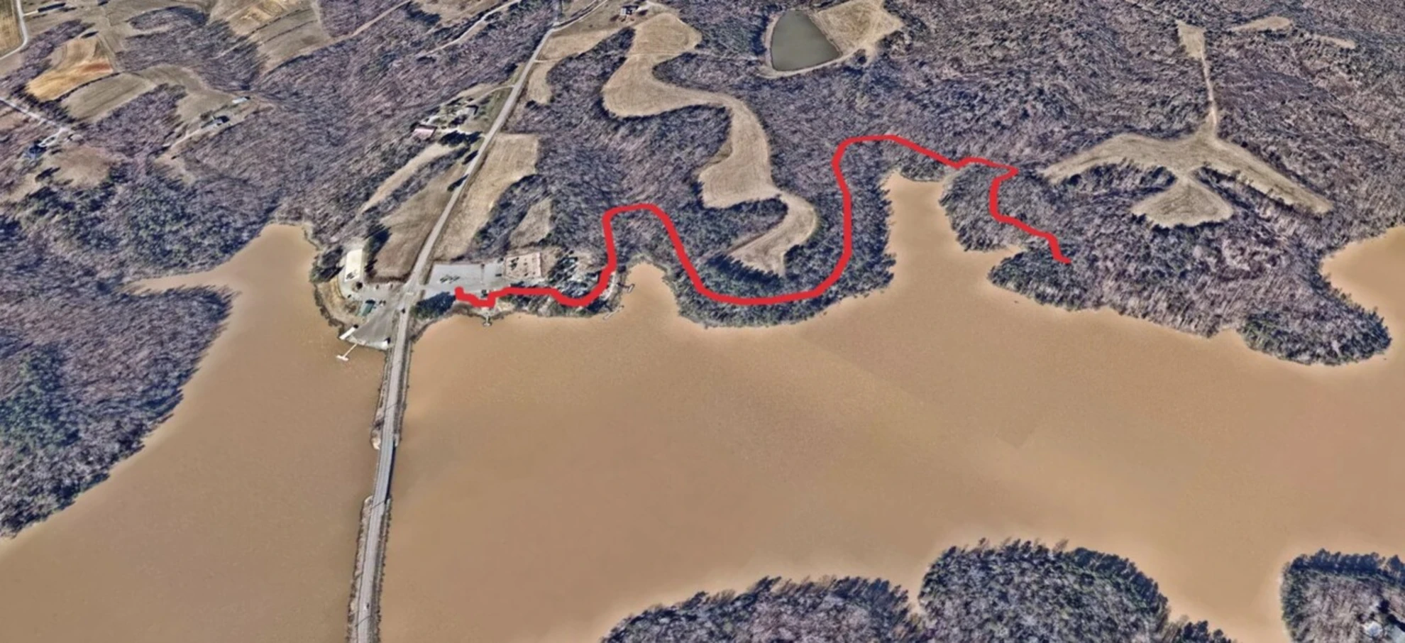 An image depicting the trail Lake Thom-A-Lex Park Walk and its surrounding area.