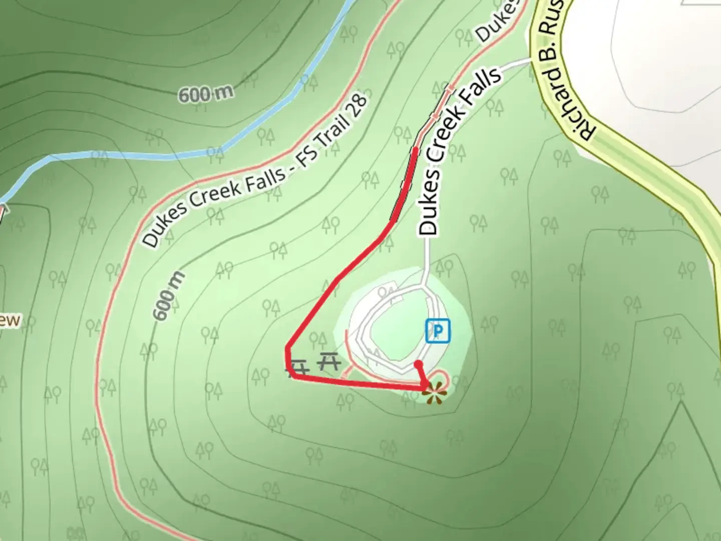 An image depicting the trail Duke Creek Falls and its surrounding area.