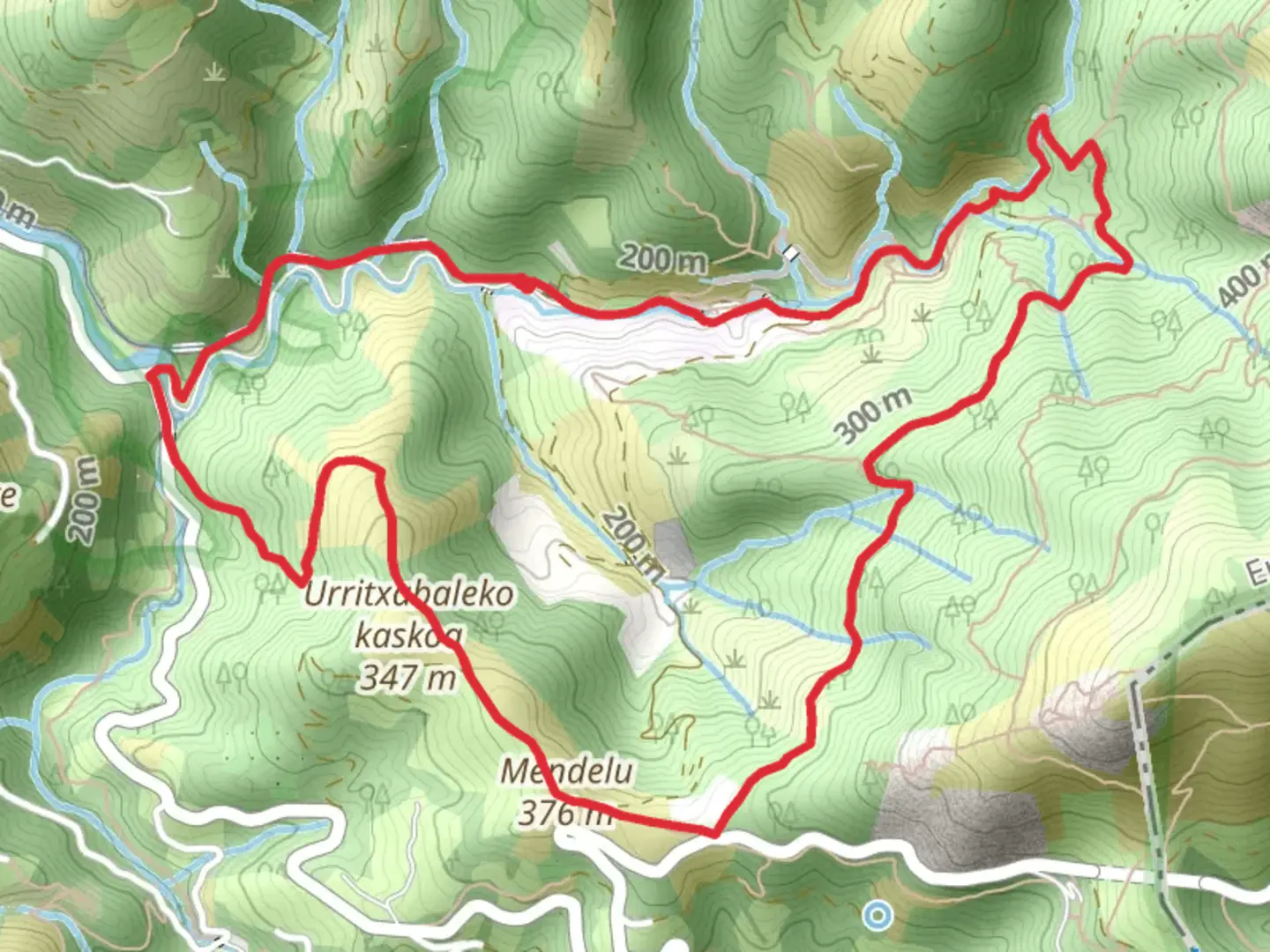 An image depicting the trail Arditurri mines PR GI 1009 and its surrounding area.