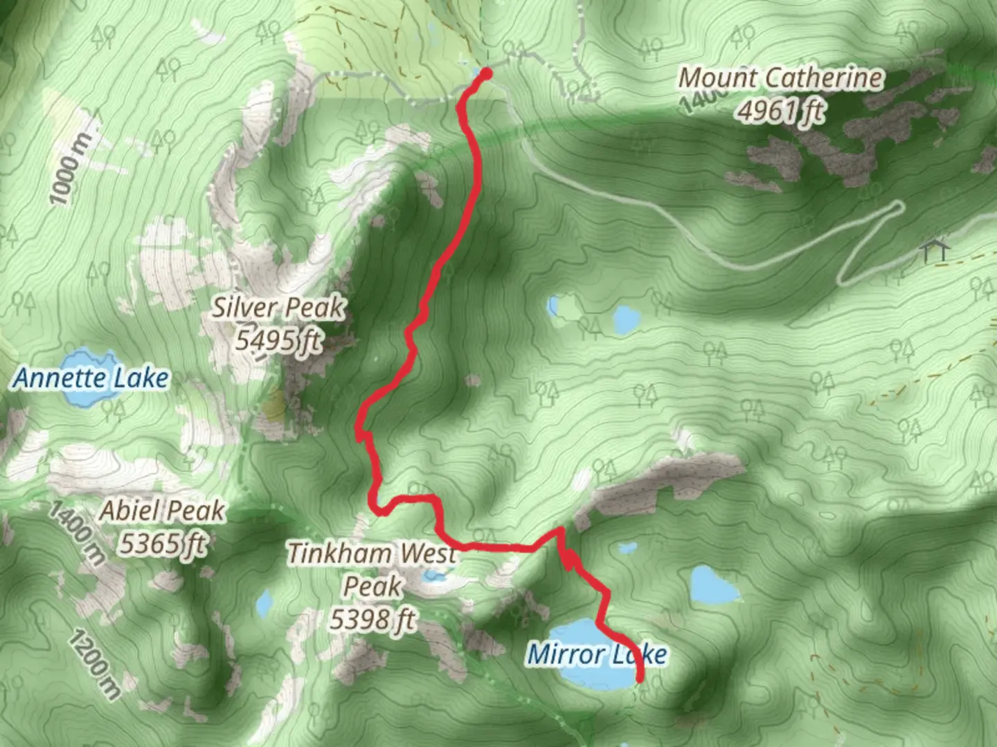 An image depicting the trail Mirror Lake from Windy Pass and its surrounding area.