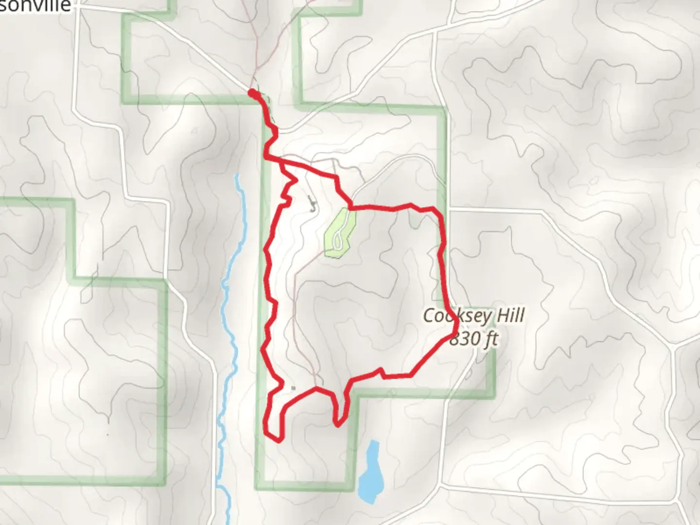 An image depicting the trail Pleasant Grove Cemetery and Sandstone Bluff Trail Red and its surrounding area.