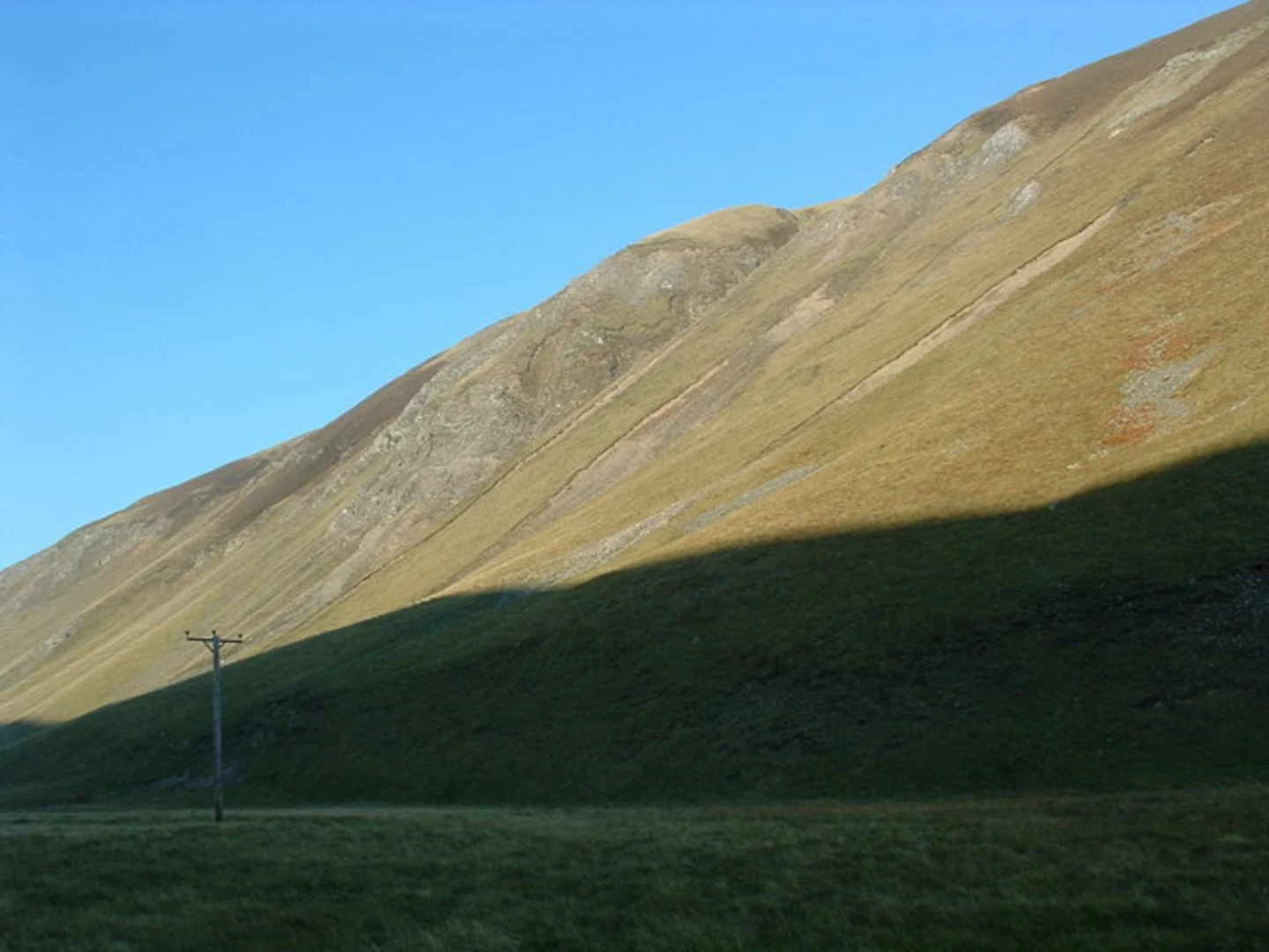 An image depicting the trail Cnap Chaochan Aitinn Loop from Tomintoul and its surrounding area.