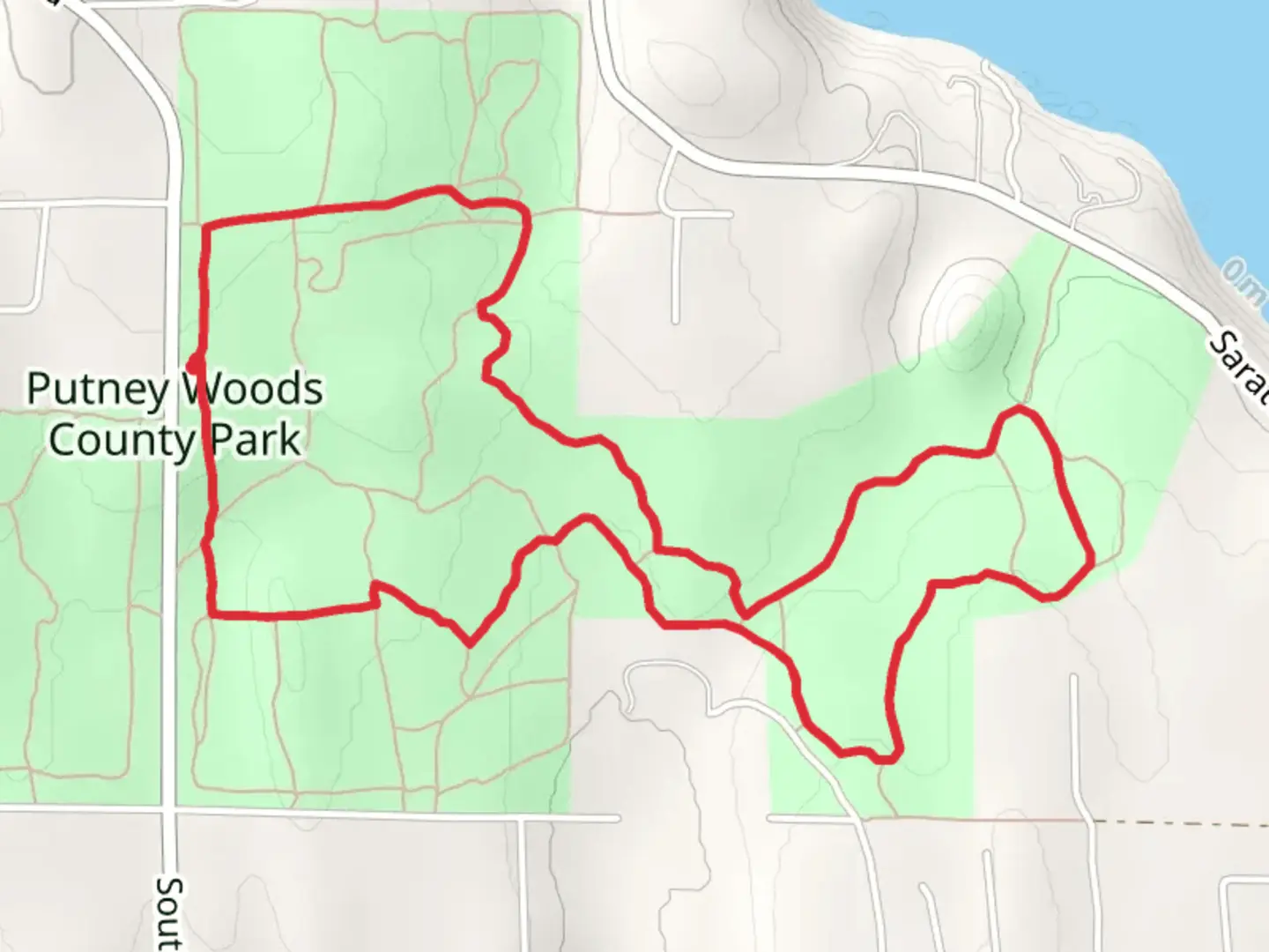 An image depicting the trail Putney Woods County Park and North Leg Saratoga Loop and its surrounding area.