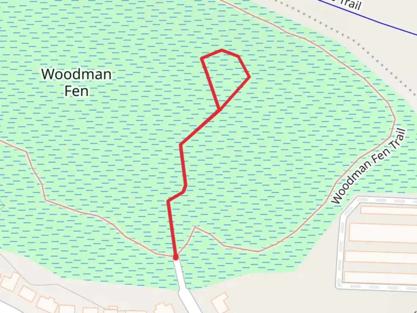 An image depicting the trail Woodman Fen Walkway and its surrounding area.