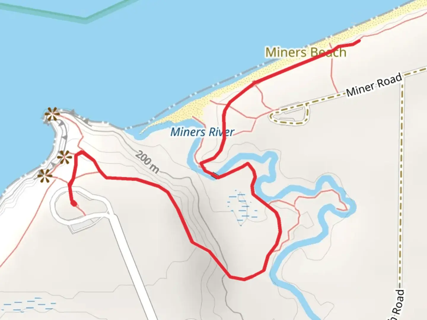 An image depicting the trail Miners Beach Walk and its surrounding area.