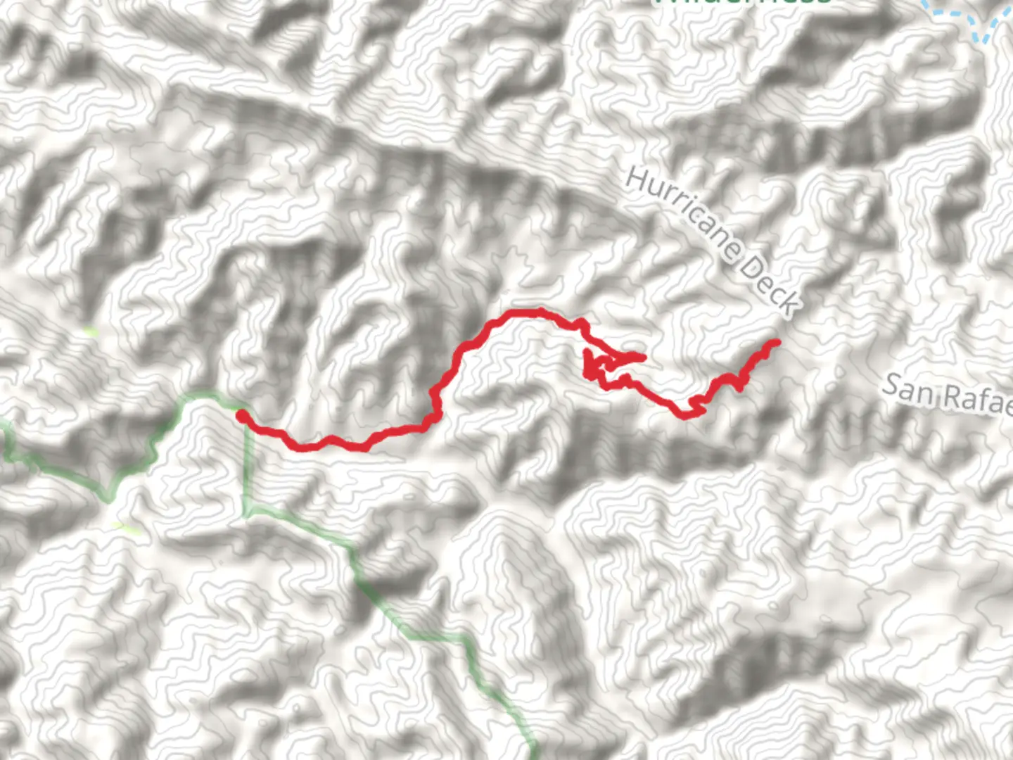 An image depicting the trail Lost Valley Trail via Manzana Trail and its surrounding area.