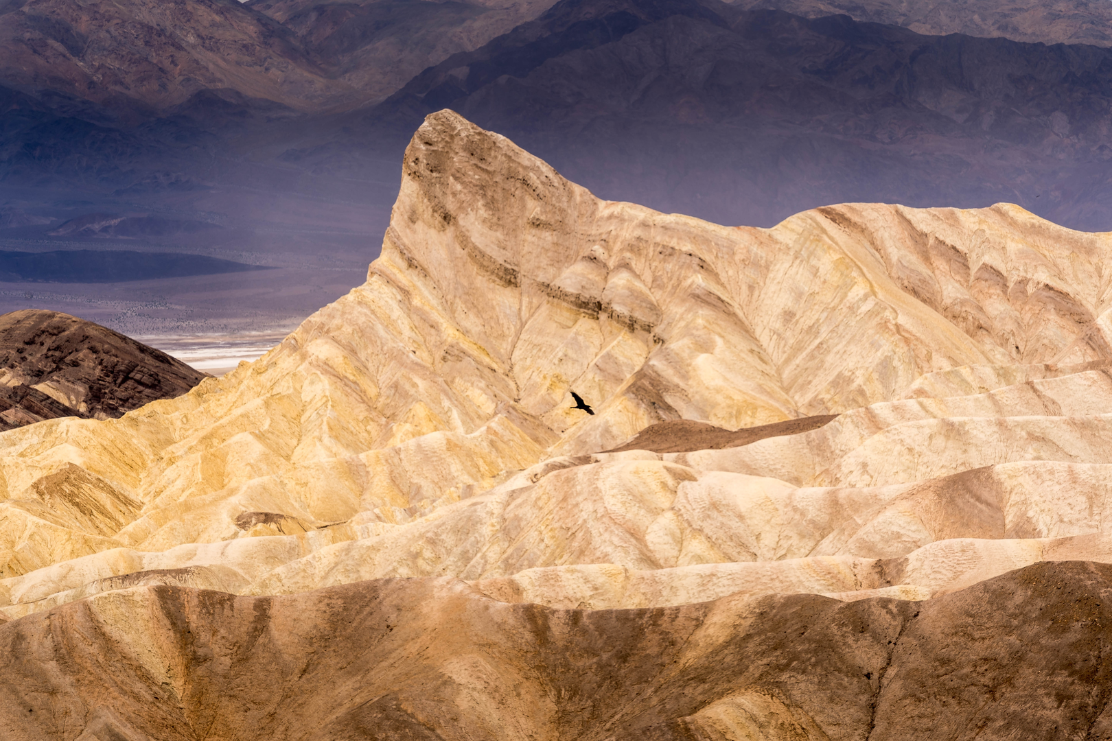 An image depicting the trail Manly Beacon Loop via Zabriskie Point Junction and its surrounding area.