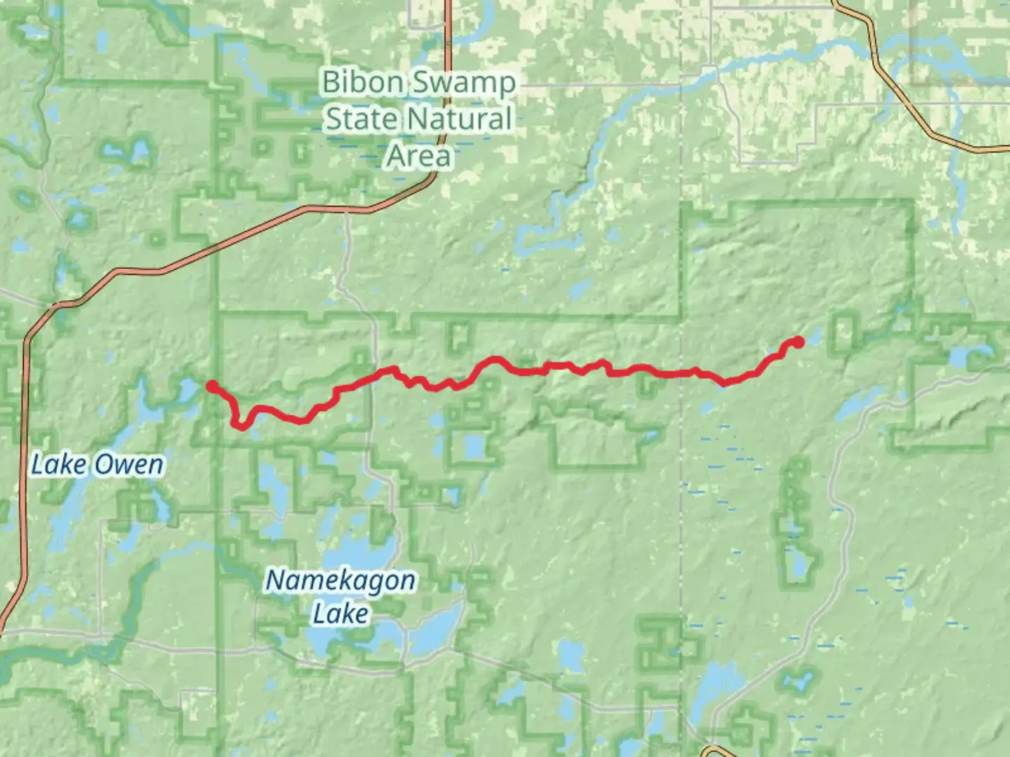 An image depicting the trail North Country Trail from Lake Three and its surrounding area.