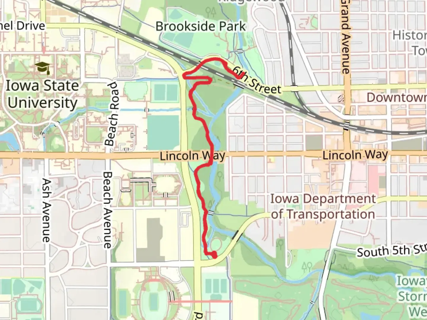 An image depicting the trail Walk beside Ioway Creek - Stuart Smith Park and its surrounding area.