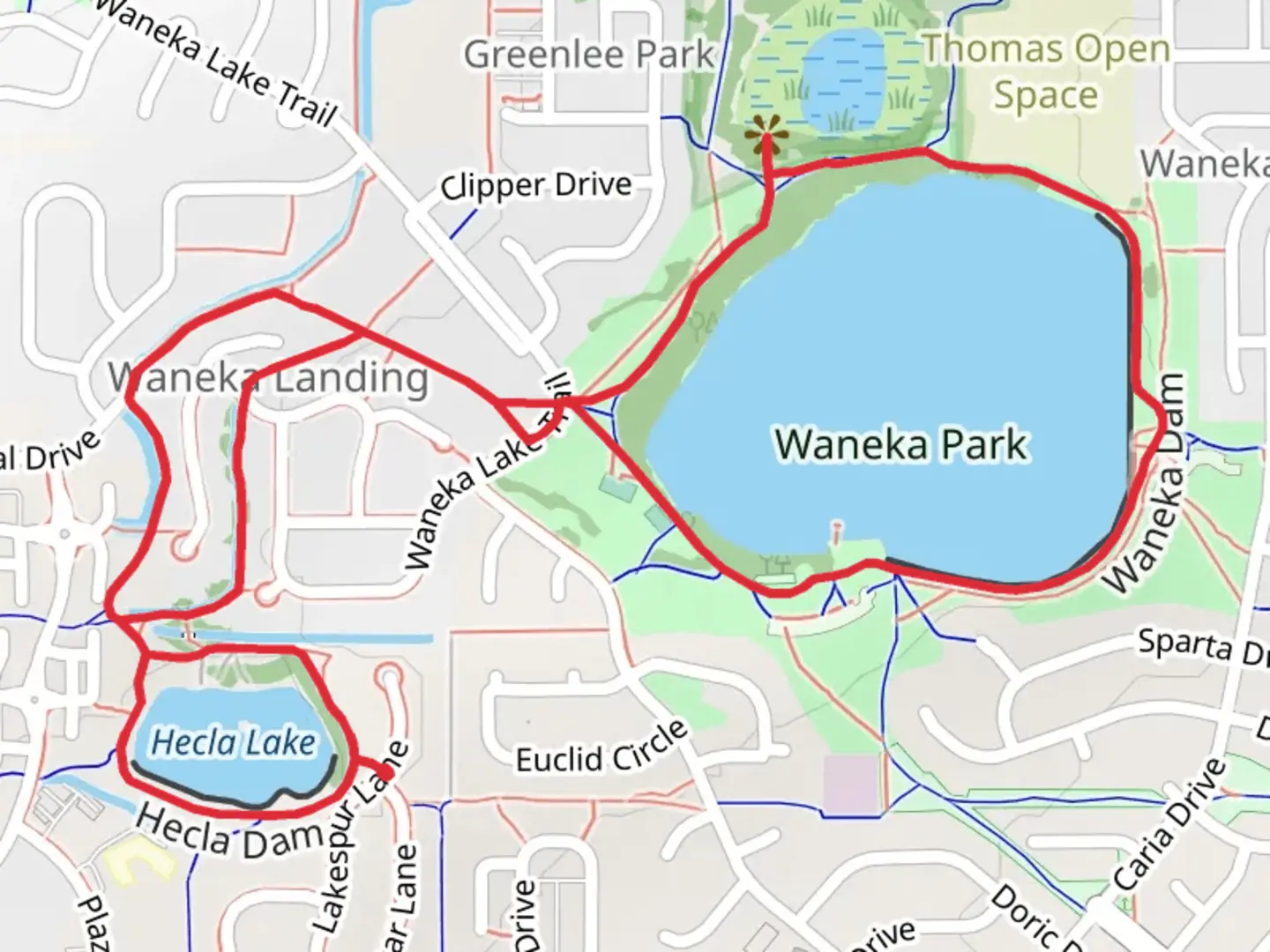 An image depicting the trail Hecla Lake and Waneka Lake Loop Trail and its surrounding area.
