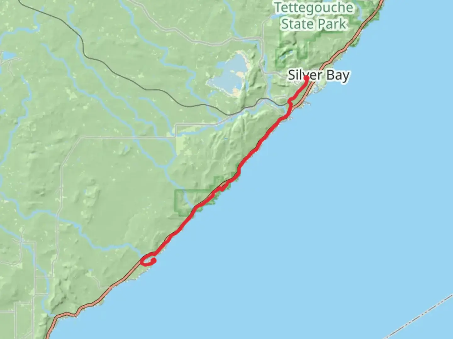 An image depicting the trail Gitchi-Gami State Trail and its surrounding area.