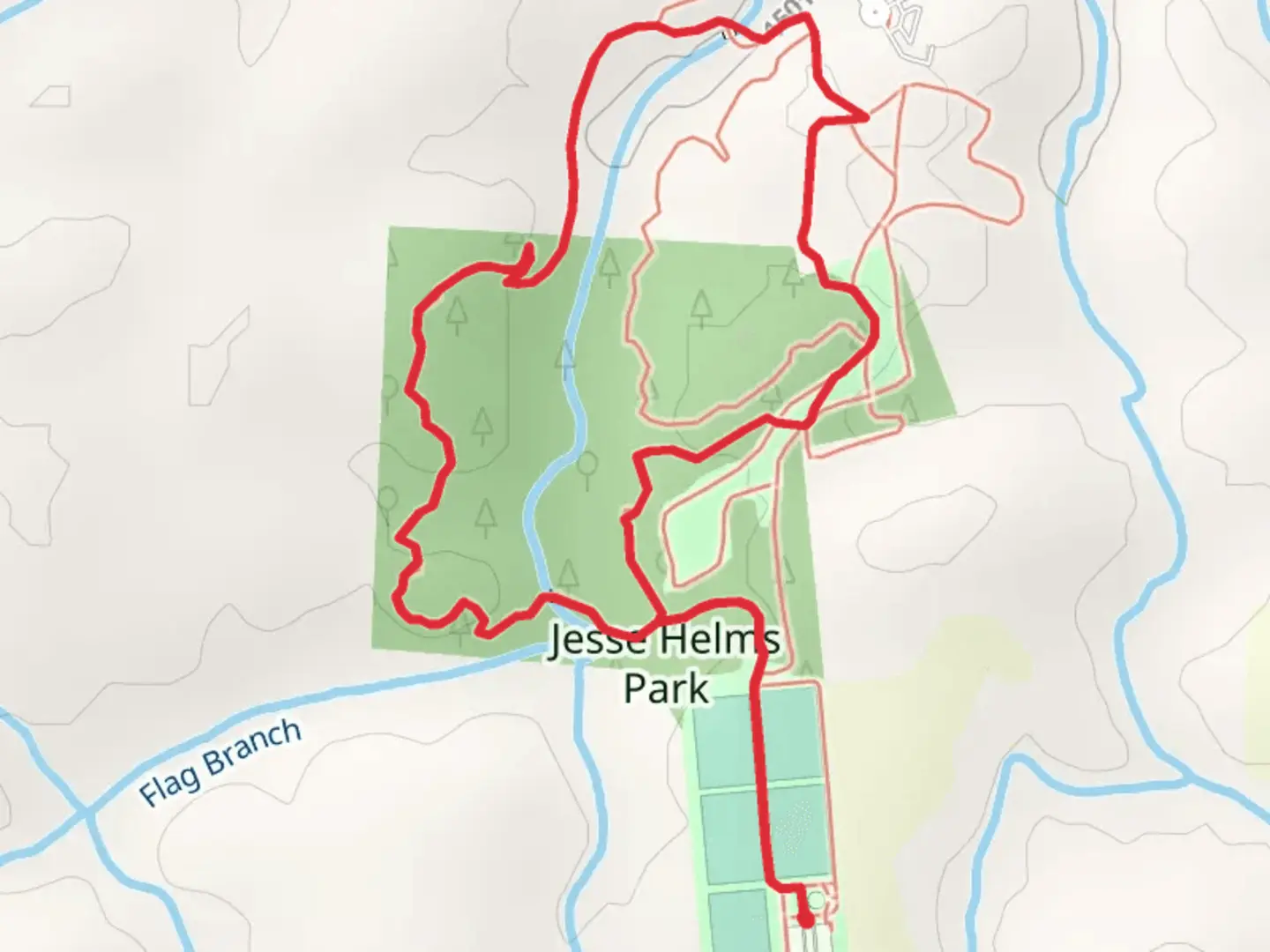 An image depicting the trail Field Track and Red Loop Trail - Jesse Helms Park and its surrounding area.