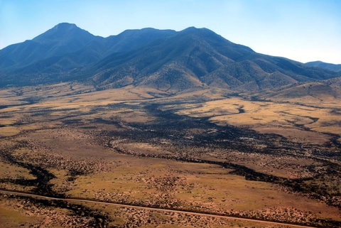 An image depicting the trail Miller Peak via Lutz Canyon Trail and its surrounding area.