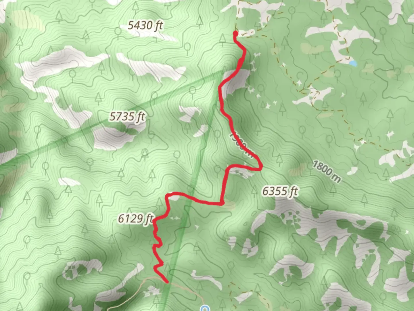An image depicting the trail Greaterville Trail and its surrounding area.