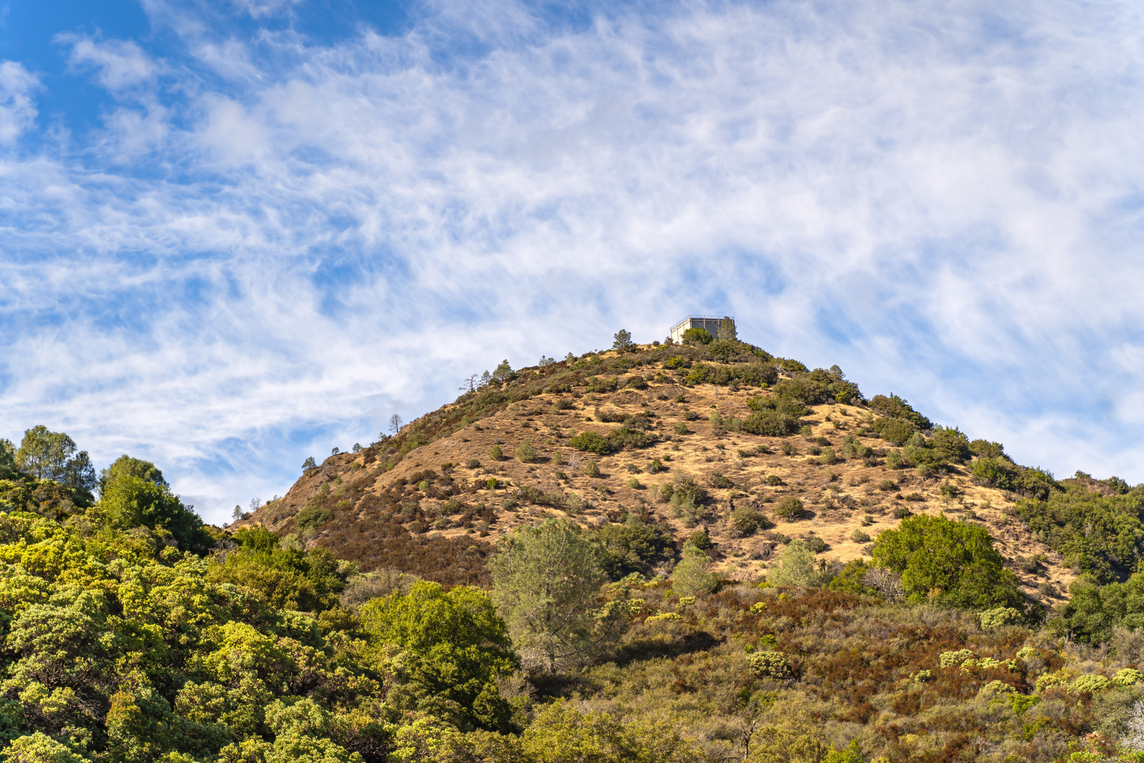 An image depicting the trail Mount Umunhum via Barlow Road and its surrounding area.