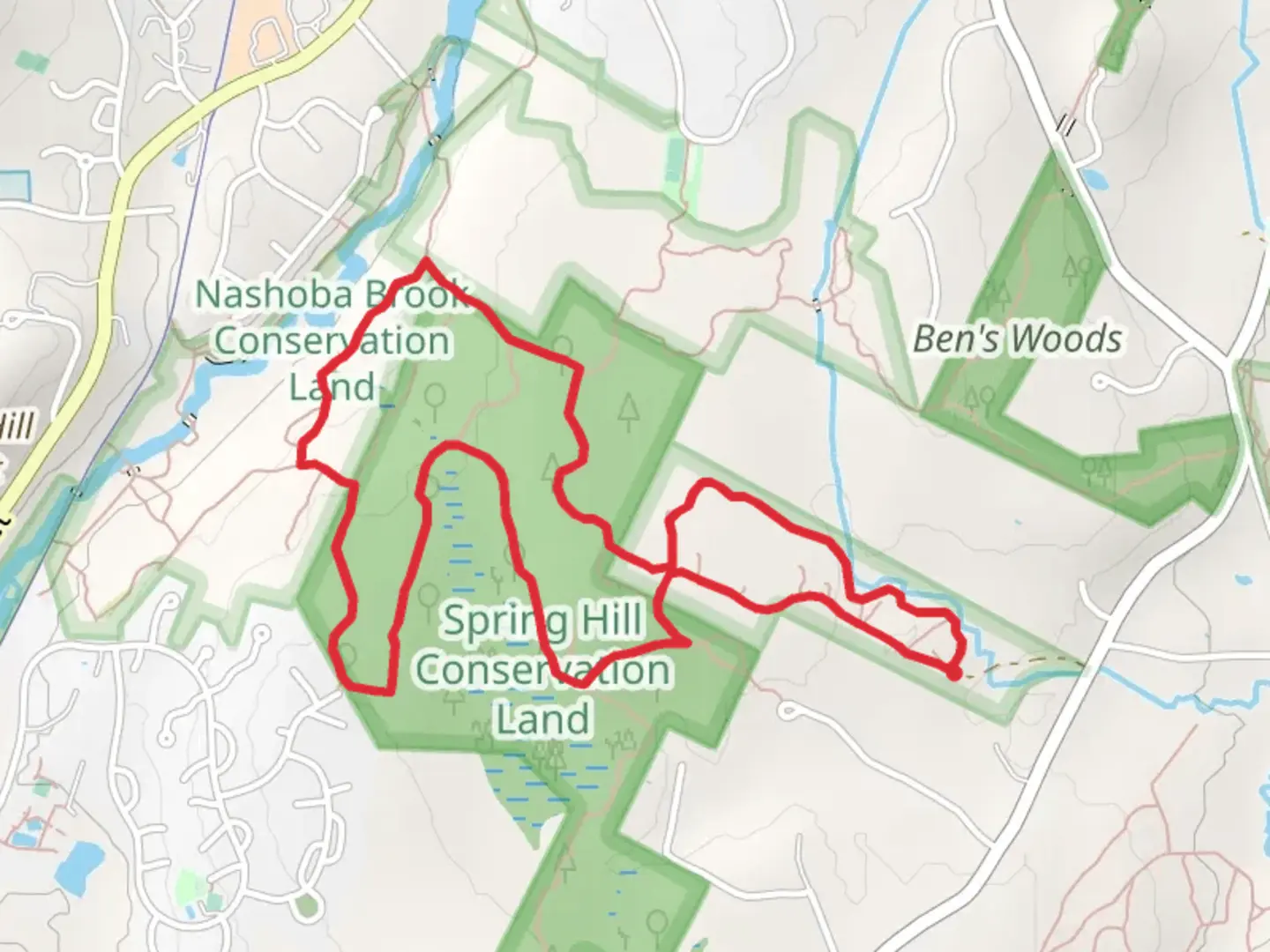 An image depicting the trail Nashoba Brook from Red Road and its surrounding area.