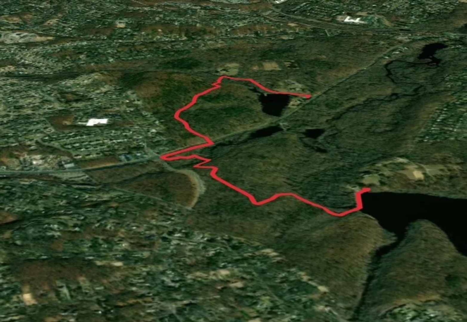 An image depicting the trail Long Island Greenbelt Trail and its surrounding area.