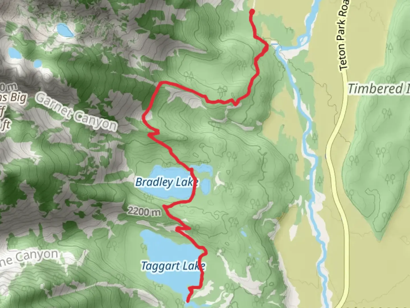 An image depicting the trail Taggart Lake and Bradley Lake via Valley Trail and its surrounding area.