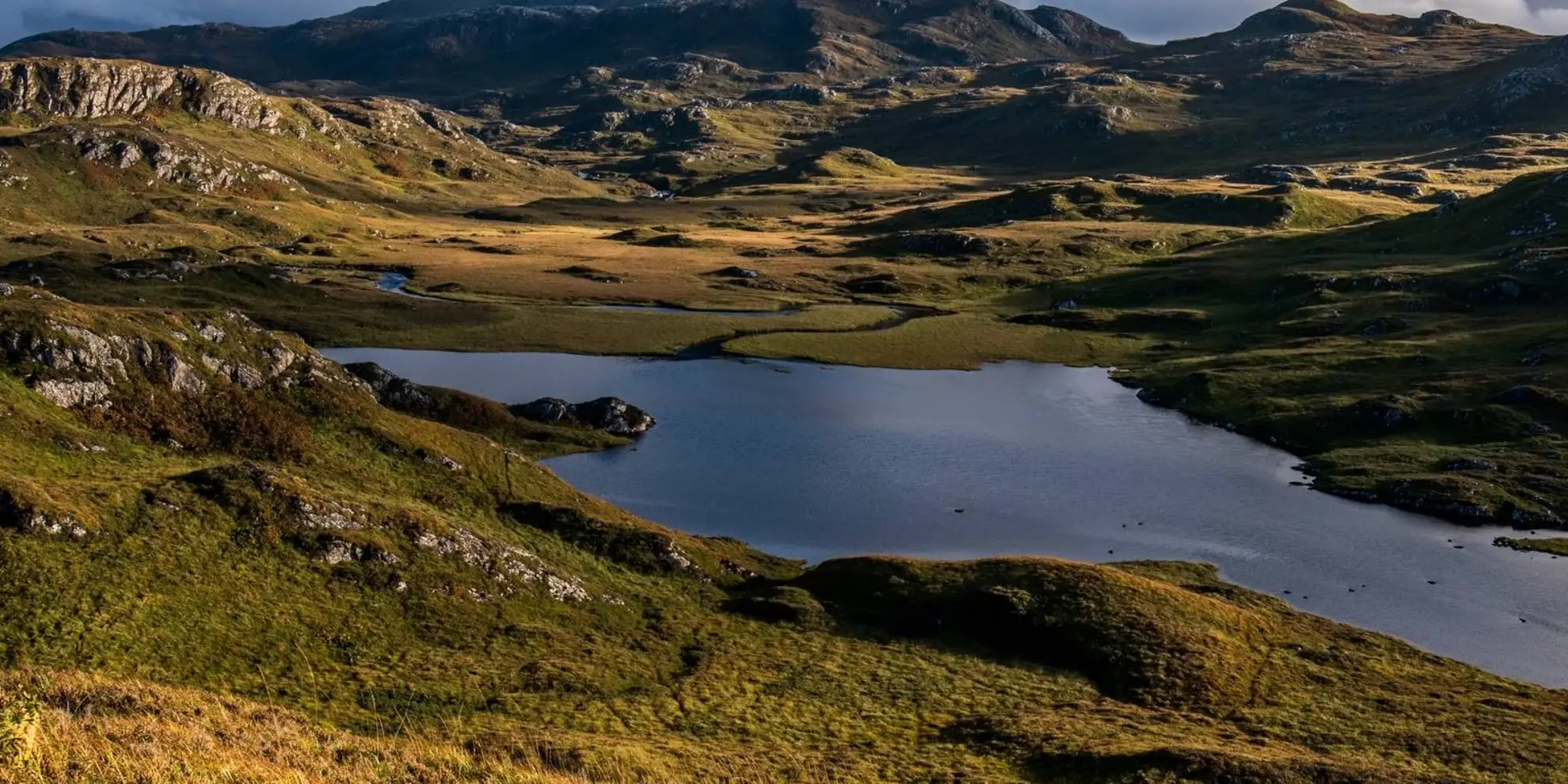 An image depicting the trail Suilven Ridge and its surrounding area.