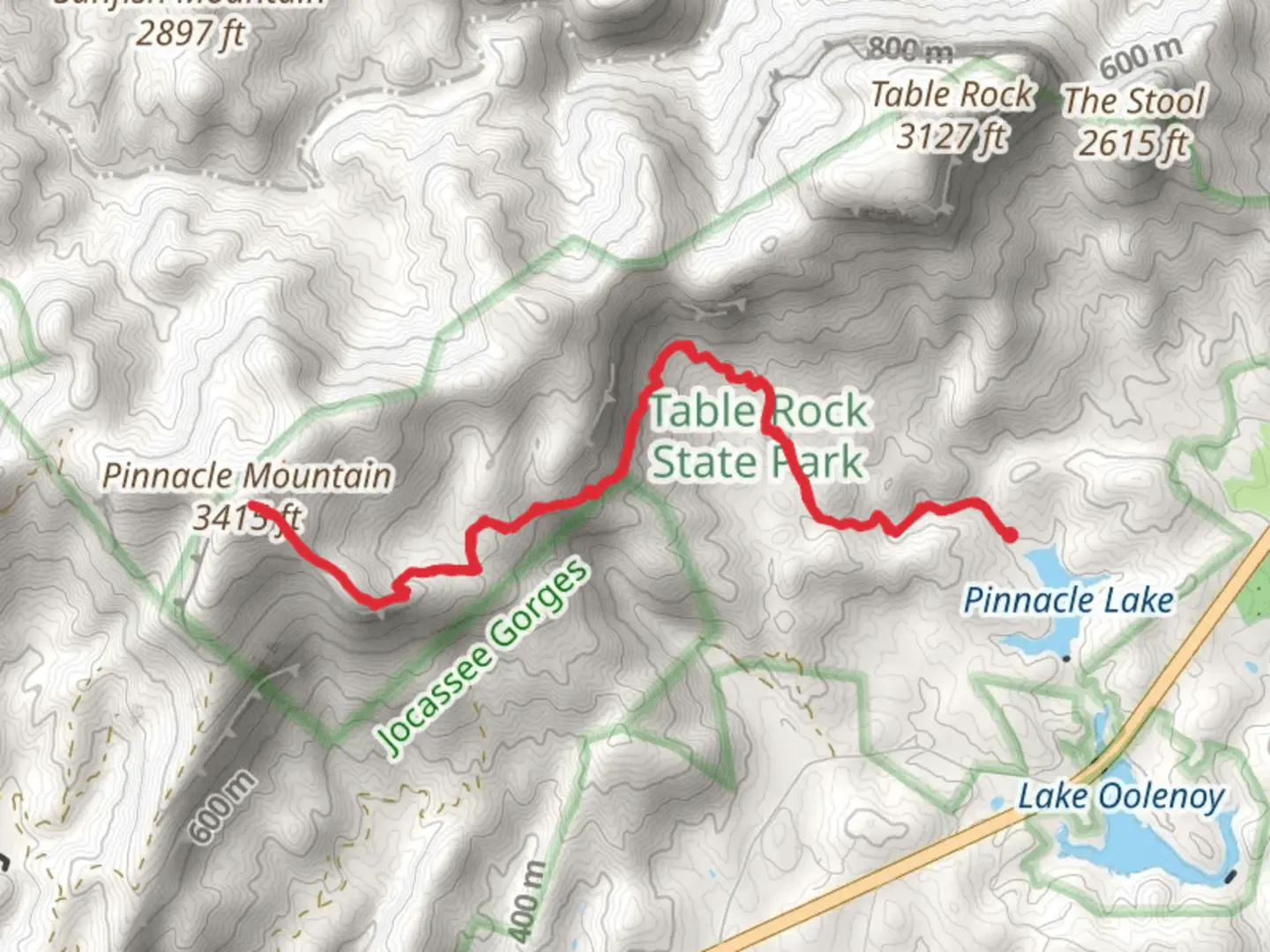 An image depicting the trail Pinnacle Mountain and its surrounding area.