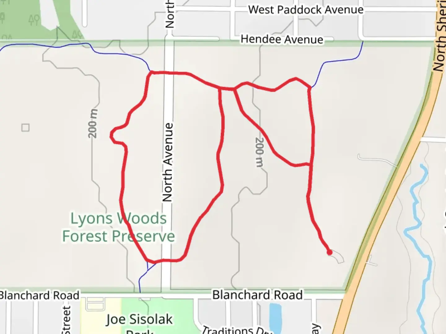 An image depicting the trail Lyons Woods Loop Trail and its surrounding area.