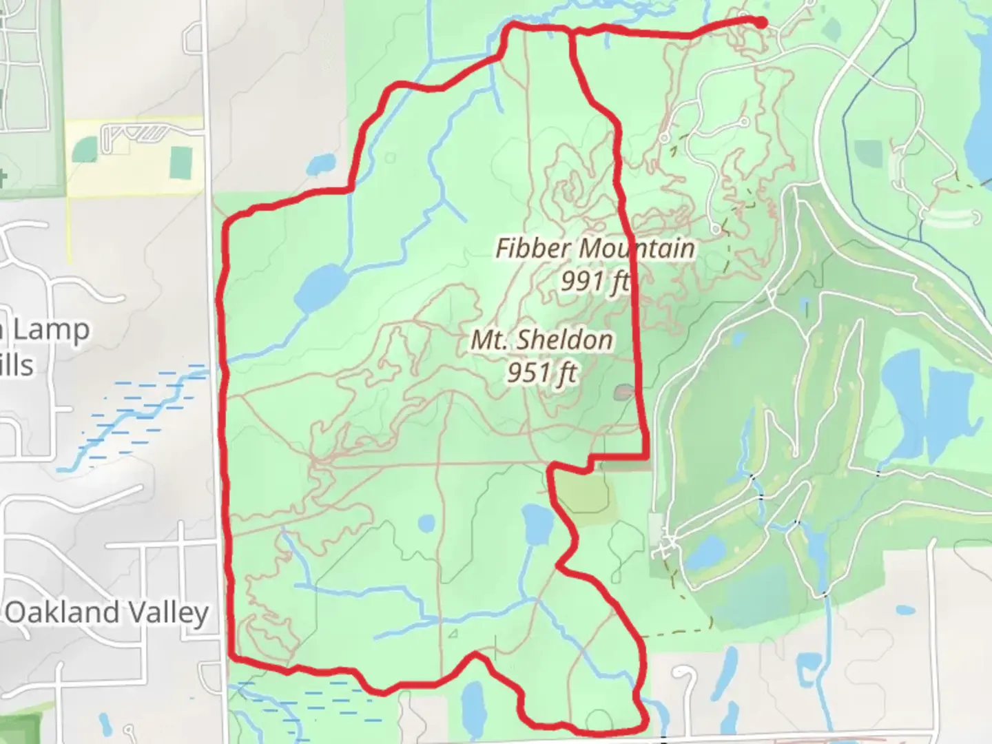 An image depicting the trail Sheldon and Fibber Mountain Loop and its surrounding area.