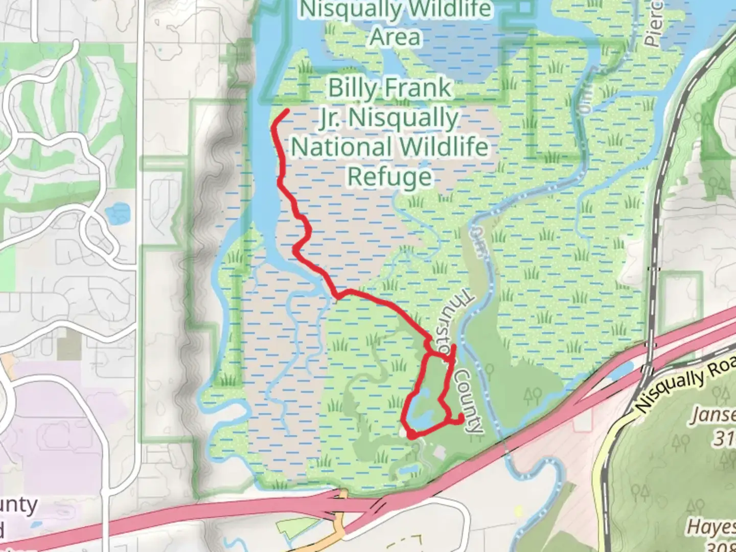 An image depicting the trail Twin Barns Loop and Nisqually Eastbury Boardwalk Trail and its surrounding area.