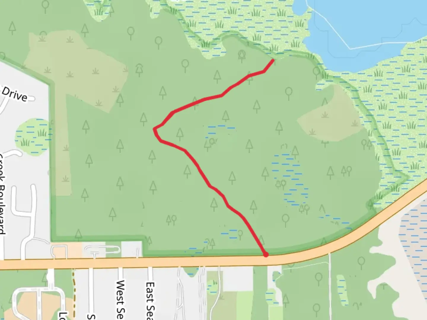 An image depicting the trail Moses Creek Conservation Area and its surrounding area.