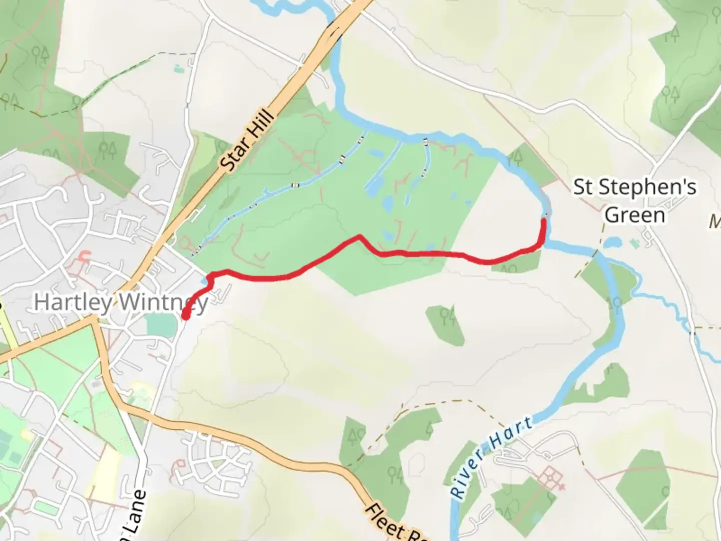 An image depicting the trail Hartley Wintney Golf Course Walk and its surrounding area.