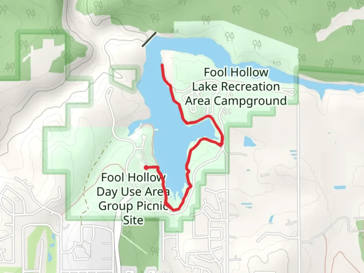 An image depicting the trail Fool Hollow Lake Shore Walk and its surrounding area.