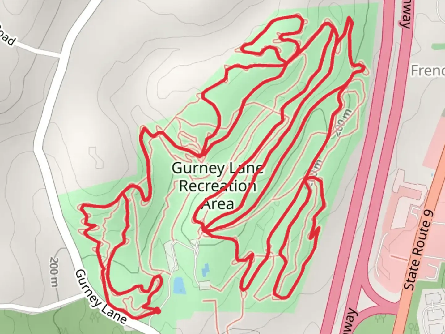 An image depicting the trail Gurney Lane Recreation Area Loop and its surrounding area.