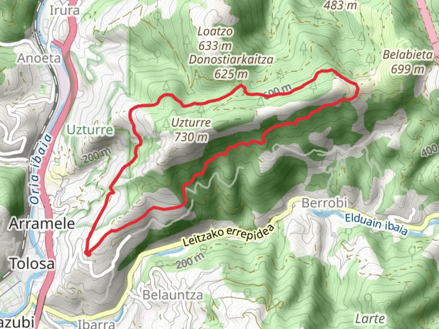 An image depicting the trail Belabietako Bidea PR GI 115 and its surrounding area.