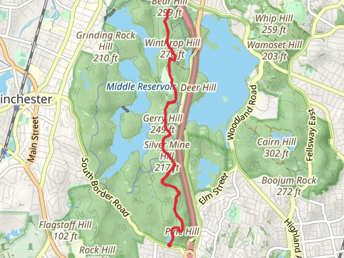 An image depicting the trail Bellevue Pond to Bear Hill and its surrounding area.
