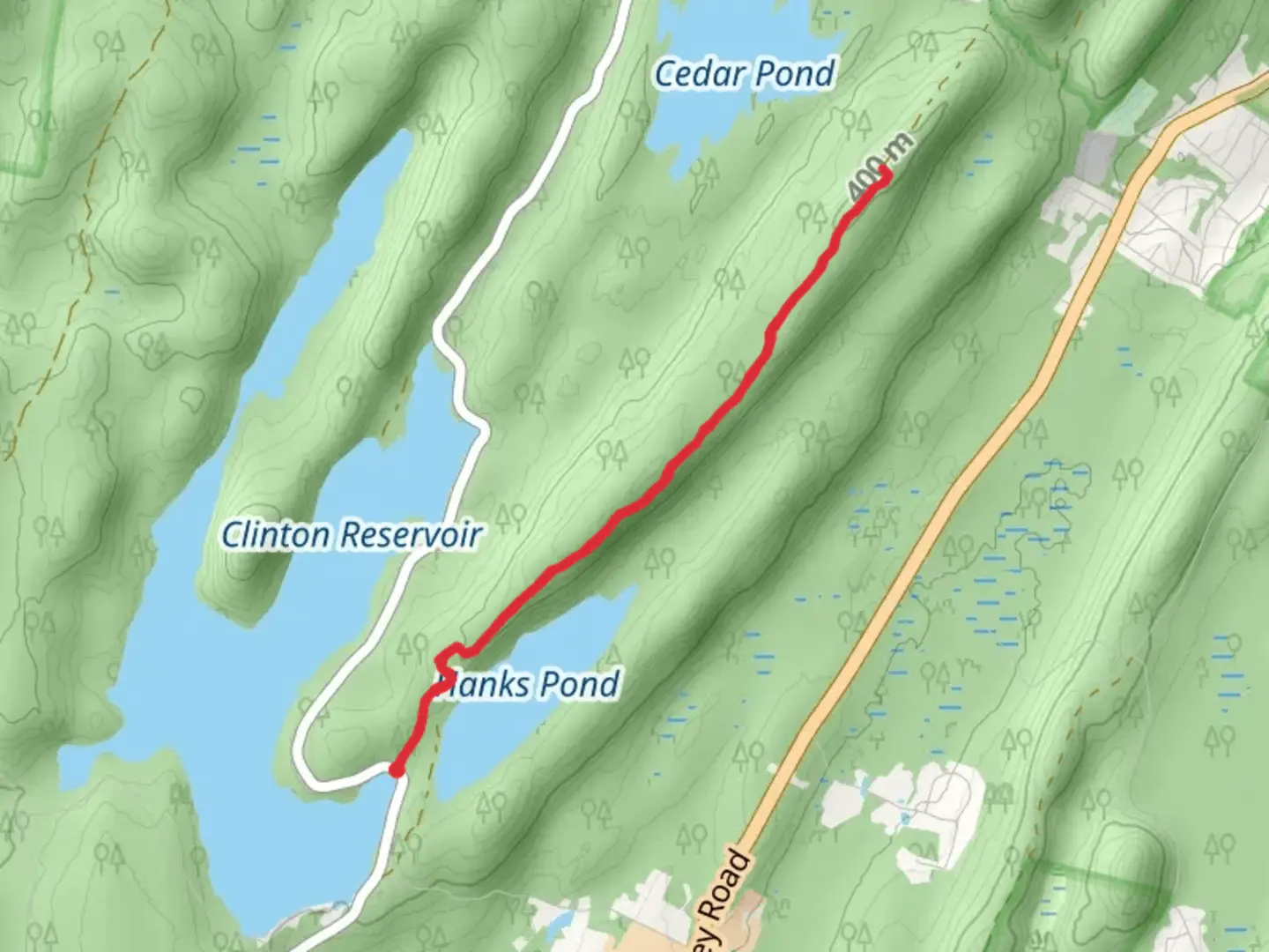 An image depicting the trail Hanks Pond - Red - White Trail and its surrounding area.