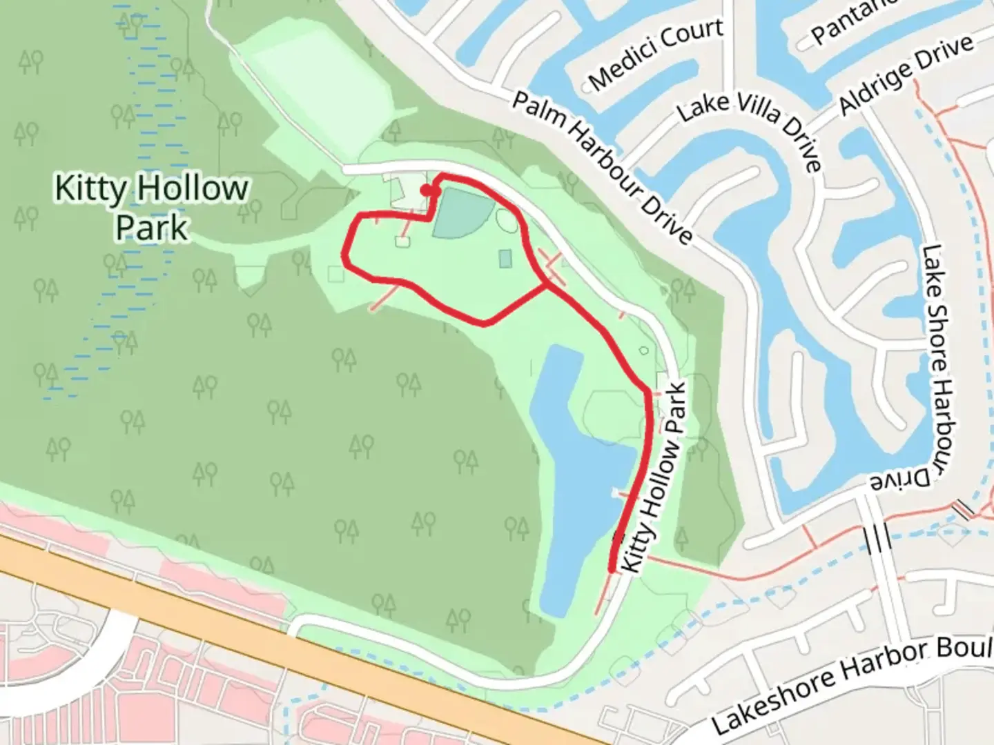 An image depicting the trail Kitty Hollow Park Loop and its surrounding area.