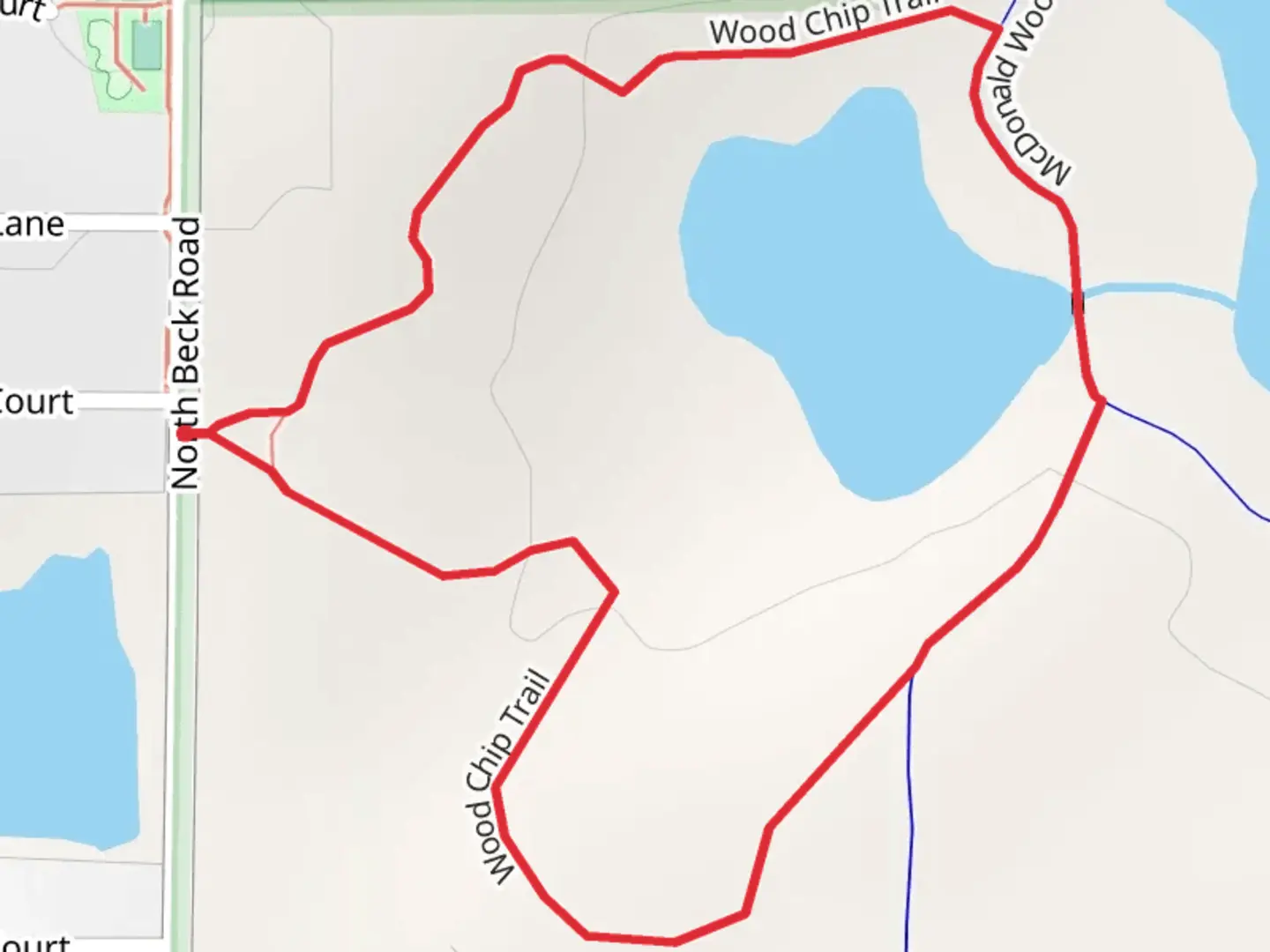 An image depicting the trail Wood Chip Loop Trail and its surrounding area.