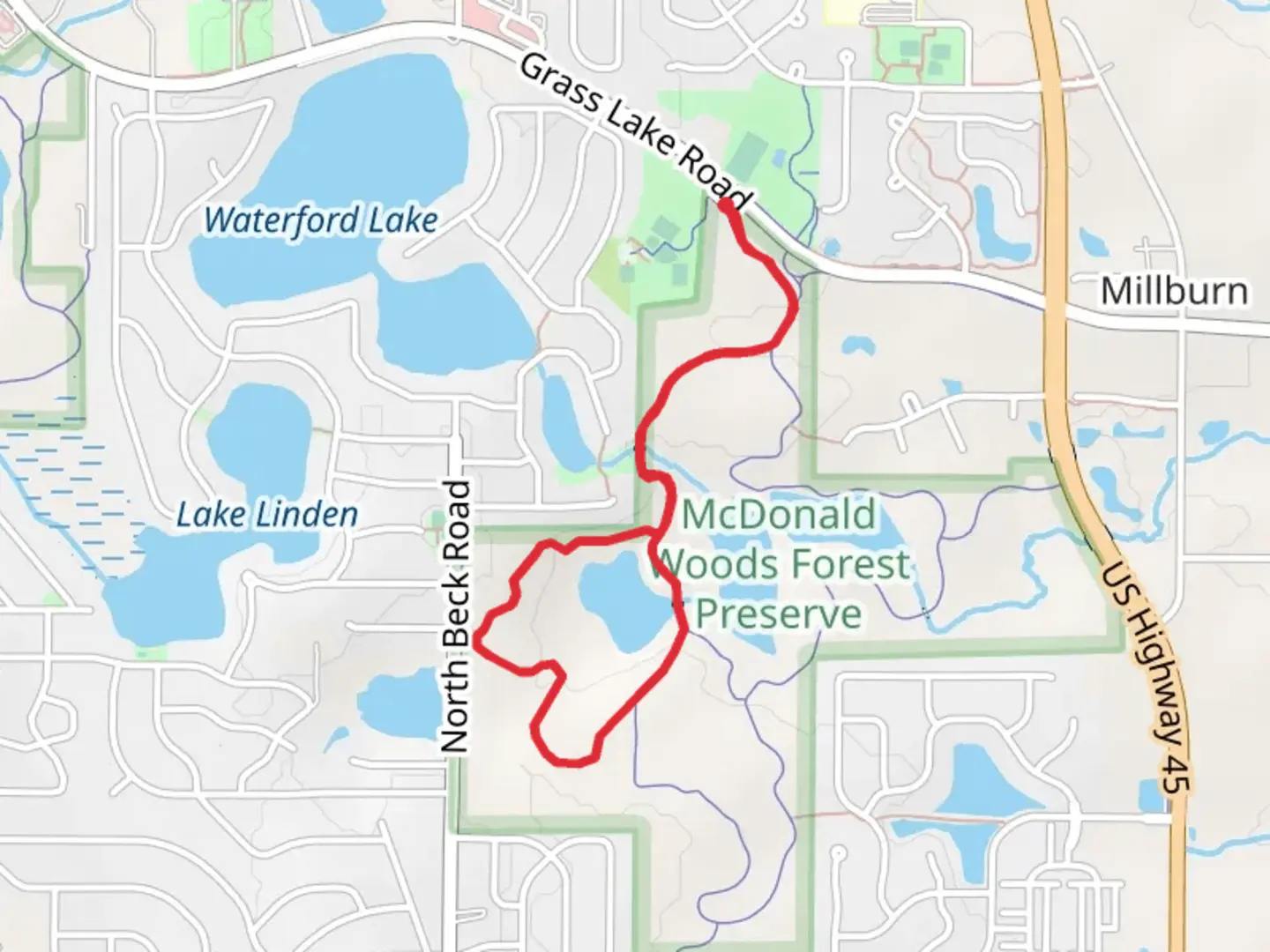 An image depicting the trail Wood Chip Loop via McDonald Lake Trail and its surrounding area.