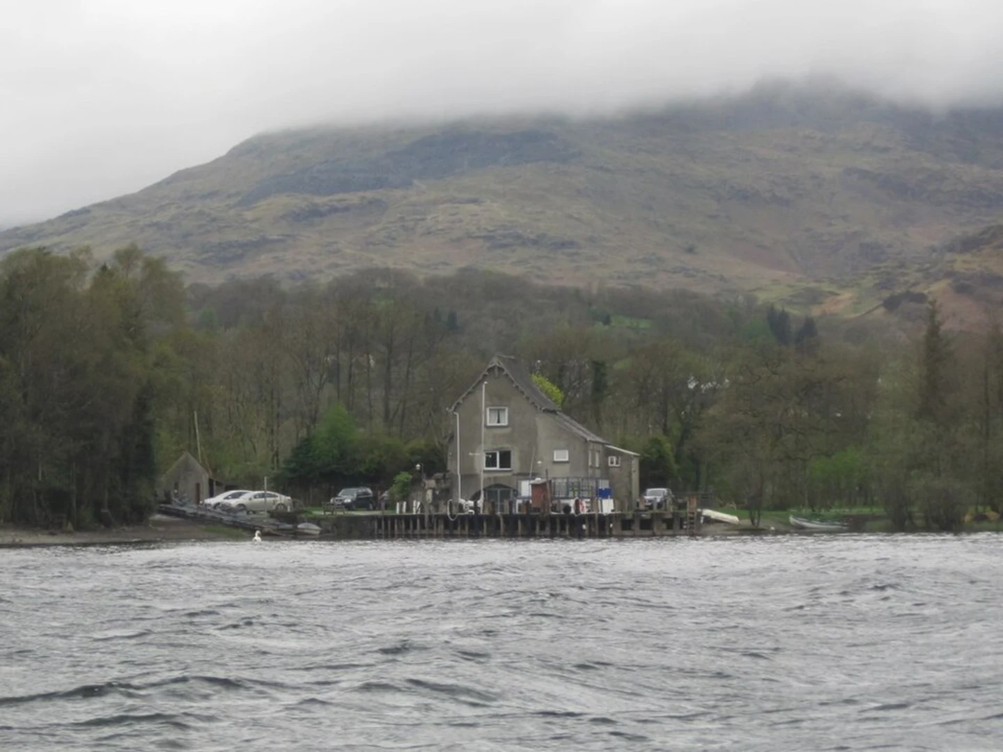 An image depicting the trail Hawkshead to Coniston Water Walk and its surrounding area.
